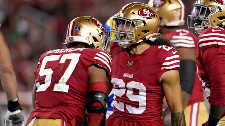 Dec 12, 2024; Santa Clara, California, USA; San Francisco 49ers linebacker Dre Greenlaw (57) is congratulated by safety Talanoa Hufanga (29) after making a tackle against the Los Angeles Rams in the first quarter at Levi's Stadium. 