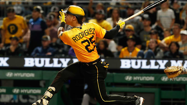 Pittsburgh Pirates catcher Endy Rodriguez (25) hits a single against the Miami Marlins during the sixth inning at PNC Park. 