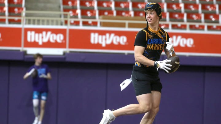 The Carroll Chargers’ Jaxx DeJean warms up before a 7-on-7 football tournament game Saturday, April 13, 2024 at the UNI Dome in Cedar Falls, Iowa. The Carroll Chargers’ Jaxx DeJean warms up before a 7-on-7 football tournament game Saturday, April 13, 2024 at the UNI Dome in Cedar Falls, Iowa.