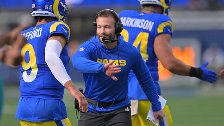 Nov 2, 2025; Inglewood, California, USA; Los Angeles Rams head coach Sean McVay reacts with quarterback Matthew Stafford (9) after a touchdown against the New Orleans Saints during the first half at SoFi Stadium. Mandatory Credit: Jayne Kamin-Oncea-Imagn Images