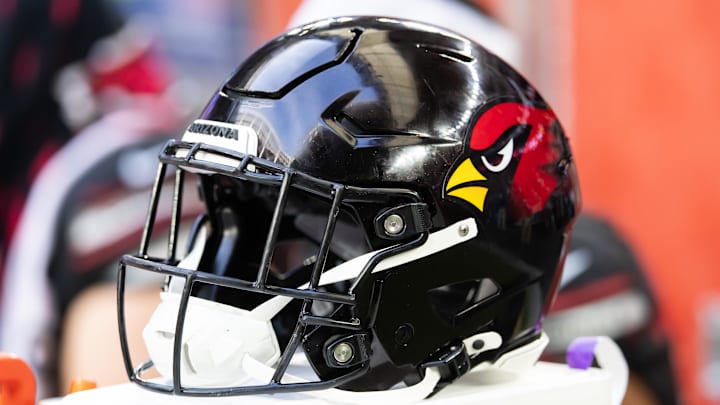 Dec 8, 2024; Glendale, Arizona, USA; Detailed view of an Arizona Cardinals helmet at State Farm Stadium. Mandatory Credit: Mark J. Rebilas-Imagn Images