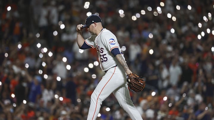 Aug 31, 2024; Houston, Texas, USA; Houston Astros relief pitcher Ryan Pressly (55) walks to the mound before the ninth inning against the Kansas City Royals at Minute Maid Park.