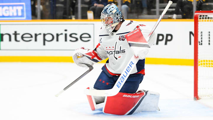 Jan 11, 2025; Nashville, Tennessee, USA;   Washington Capitals goaltender Logan Thompson (48) against the Nashville Predators during the first period at Bridgestone Arena. Mandatory Credit: Steve Roberts-Imagn Images