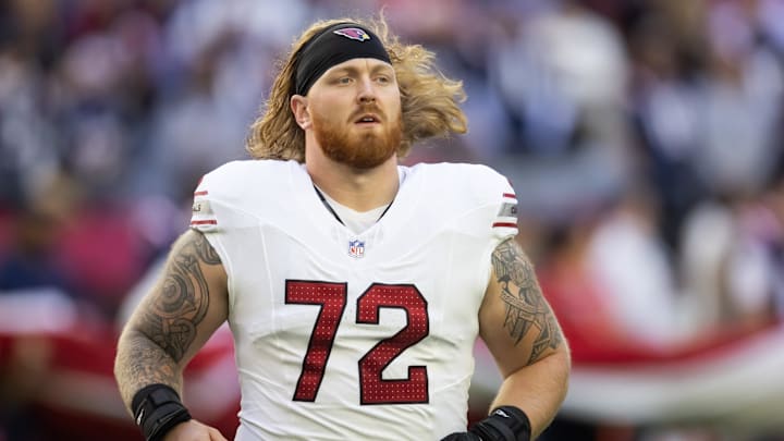 Dec 15, 2024; Glendale, Arizona, USA; Arizona Cardinals guard Hjalte Froholdt (72) against the New England Patriots at State Farm Stadium. Mandatory Credit: Mark J. Rebilas-Imagn Images