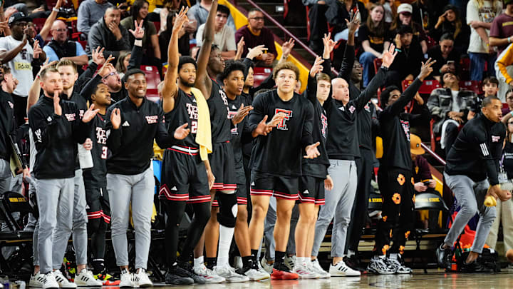 Mar 8, 2025; Tempe, Arizona, USA;  Texas Tech Red Raiders bench reacts to a three pointer during the second half against the Arizona State Sun Devils at Desert Financial Arena. Mandatory Credit: Arianna Grainey-Imagn Images