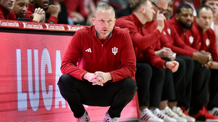 Dec 22, 2025; Bloomington, Indiana, USA; Indiana Hoosiers head coach Darian Devries looks on during the first half against the Siena Saints at Simon Skjodt Assembly Hall. Mandatory Credit: Robert Goddin-Imagn Images