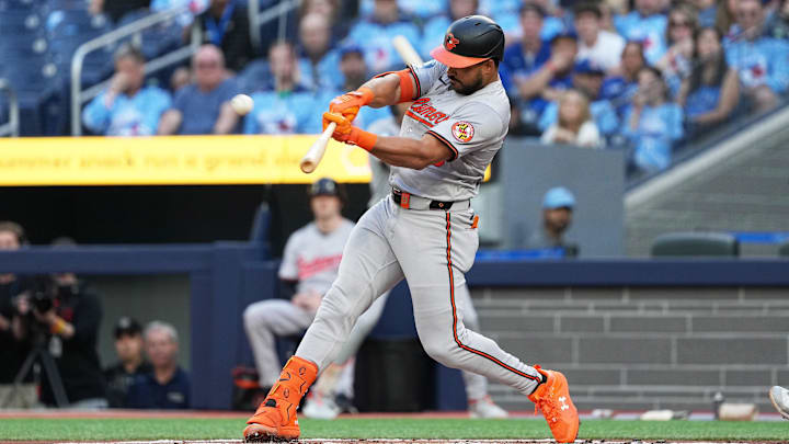 Aug 7, 2024; Toronto, Ontario, CAN; Baltimore Orioles right fielder Anthony Santander (25) hits a two run home run against the Toronto Blue Jays during the first inning at Rogers Centre. Aug 7, 2024; Toronto, Ontario, CAN; Baltimore Orioles right fielder Anthony Santander (25) hits a two run home run against the Toronto Blue Jays during the first inning at Rogers Centre.