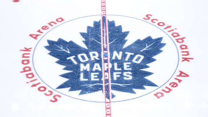 Apr 20, 2025; Toronto, Ontario, CAN; The Toronto Maple Leafs logo at center ice before game one of the first round of the 2025 Stanley Cup Playoffs against the Ottawa Senators at Scotiabank Arena. Mandatory Credit: John E. Sokolowski-Imagn Images