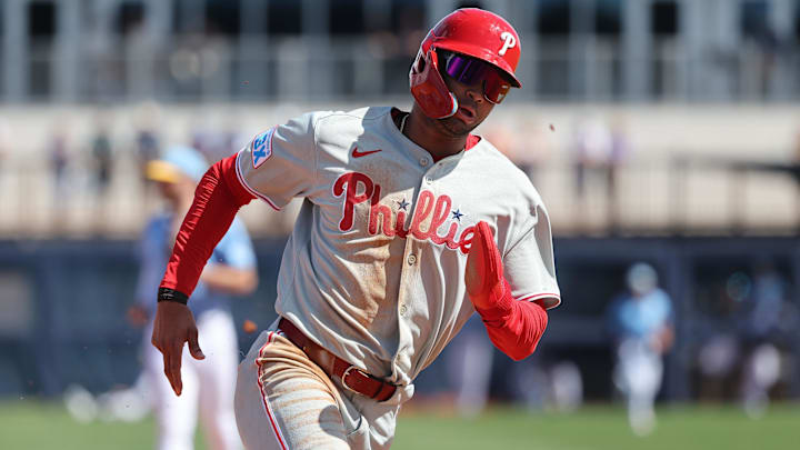 Justin Crawford doubled 390 feet off the wall in left-center to open Phillies spring training.