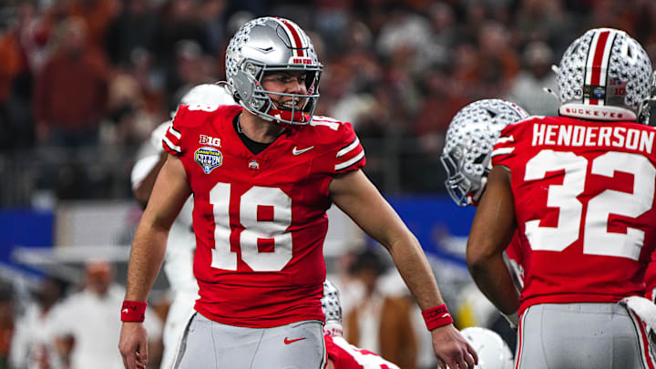Ohio State quarterback Will Howard (18) yells instructions to his team during the College Football Playoff semifinal game against the Texas Longhorns in the Cotton Bowl at AT&T Stadium on Friday, Jan. 10, 2024 in Arlington, Texas.