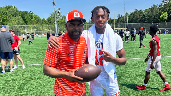 2027 DB Sire Hall and head coach Fran Brown