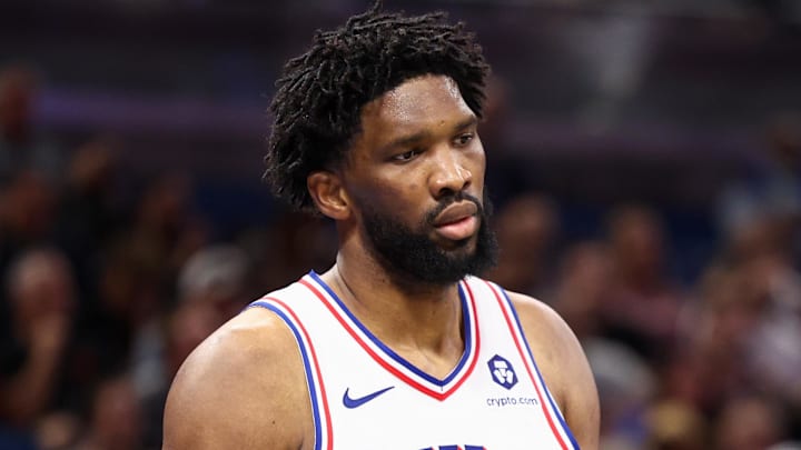 Nov 15, 2024; Orlando, Florida, USA; Philadelphia 76ers center Joel Embiid (21) looks on against the Orlando Magic in the third quarter at Kia Center. Mandatory Credit: Nathan Ray Seebeck-Imagn Images