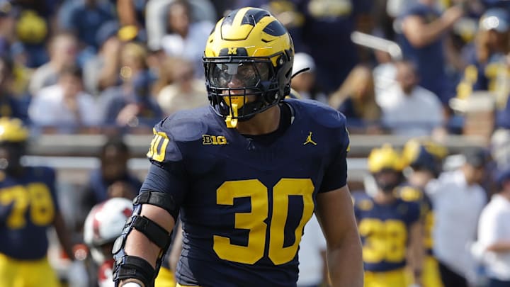 Sep 14, 2024; Ann Arbor, Michigan, USA;  Michigan Wolverines linebacker Jimmy Rolder (30) pursues a play on defense against the Arkansas State Red Wolves at Michigan Stadium. Mandatory Credit: Rick Osentoski-Imagn Images