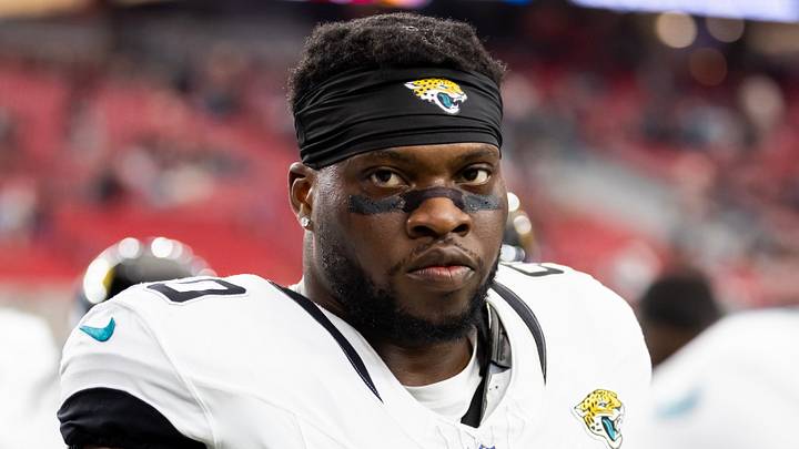 Nov 23, 2025; Glendale, Arizona, USA; Jacksonville Jaguars defensive lineman Emmanuel Ogbah (90) against the Arizona Cardinals at State Farm Stadium. Mandatory Credit: Mark J. Rebilas-Imagn Images