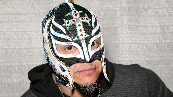 WWE superstar Rey Mysterio Jr. gives a gift to the San Diego Padres