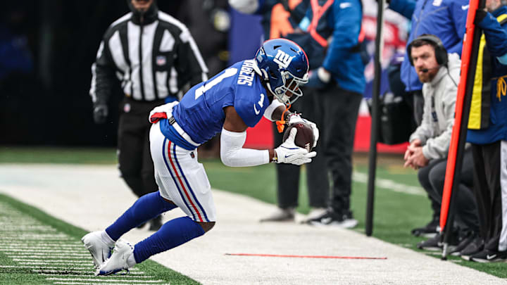Dec 15, 2024; East Rutherford, New Jersey, USA; New York Giants wide receiver Malik Nabers (1) makes a catch during the first half against the Baltimore Ravens at MetLife Stadium. Mandatory Credit: Vincent Carchietta-Imagn Images