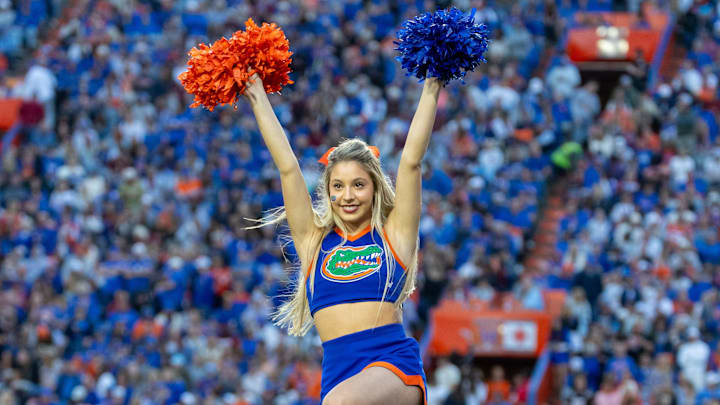 Florida Gators cheerleader works the crowd during the first quarter against the Florida State Seminoles at Ben Hill Griffin Stadium.