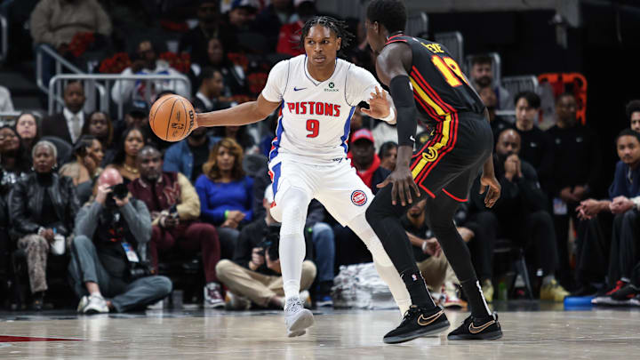 Feb 23, 2025; Atlanta, Georgia, USA; Atlanta Hawks forward Mouhamed Gueye (18) plays defense against Detroit Pistons forward Ausar Thompson (9) during the first quarter at State Farm Arena. Mandatory Credit: Jordan Godfree-Imagn Images