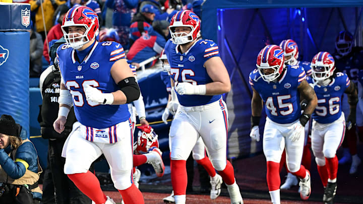 Buffalo Bills C Connor McGovern and G David Edwards  lead the team onto the field before a game against the New York Jets.