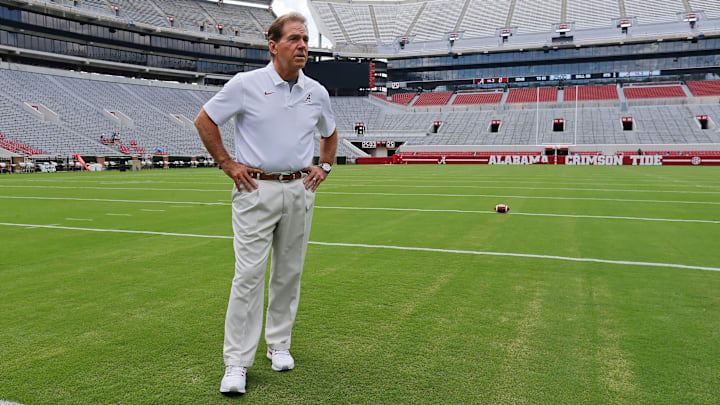 Alabama football coach Nick Saban stands on the turf inside Bryant-Denny Stadium during his team's media day in 2019.