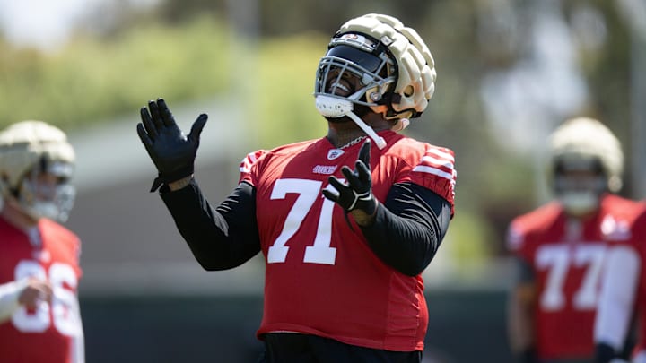 Jun 10, 2025; Santa Clara, CA, USA; San Francisco 49ers offensive tackle Trent Williams (71) reacts to a blocking drill during an OTA at Levi's Stadium. Mandatory Credit: D. Ross Cameron-Imagn Images