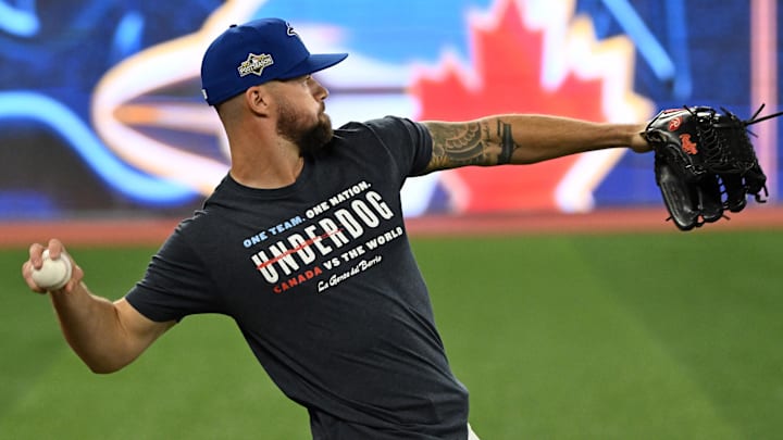 Oct 11, 2025; Toronto, Ontario, CA;  Toronto Blue Jays outfielder Nathan Lukes (38) winds up to throw the ball during workouts for the American League Championship Series at Rogers Centre.  