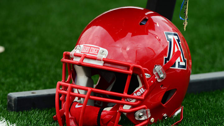Dec. 15, 2012; Albuquerque, NM, USA; Detailed view of an Arizona Wildcats helmet during the game against the Nevada Wolf Pack in the 2012 New Mexico Bowl at University Stadium. Arizona defeated Nevada 49-48. Mandatory Credit: Mark J. Rebilas-Imagn Images Dec. 15, 2012; Albuquerque, NM, USA; Detailed view of an Arizona Wildcats helmet during the game against the Nevada Wolf Pack in the 2012 New Mexico Bowl at University Stadium. Arizona defeated Nevada 49-48. Mandatory Credit: Mark J. Rebilas-Imagn Images