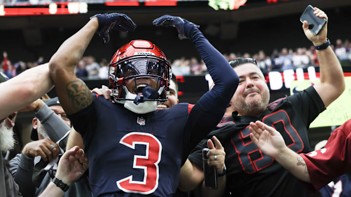 Nov 19, 2023; Houston, Texas, USA;  Houston Texans wide receiver Tank Dell (3) jumps in the stands