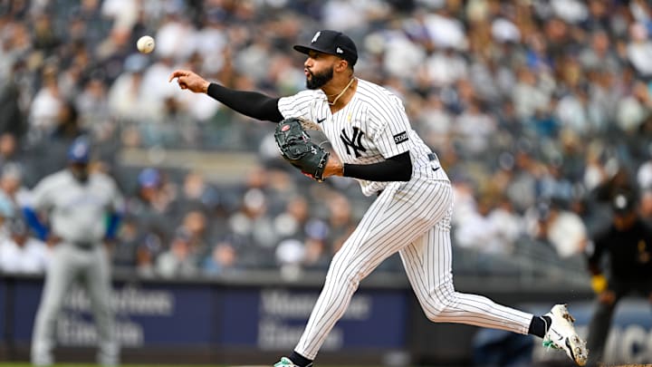 Sep 7, 2025; Bronx, New York, USA; New York Yankees relief pitcher Devin Williams (38) pitches the ball during the eighth inning against the Toronto Blue Jays at Yankee Stadium. Mandatory Credit: Mark Smith-Imagn Images
