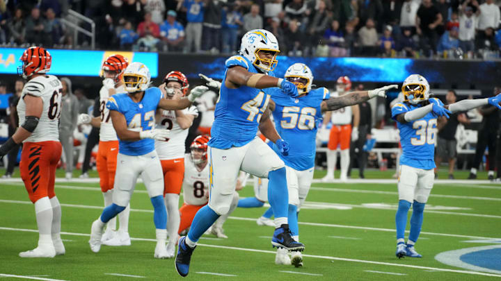Nov 17, 2024; Inglewood, California, USA; Los Angeles Chargers linebacker Tuli Tuipulotu (45) reacts after a missed 51-yard field goal by Cincinnati Bengals place kicker Evan McPherson (2) in the fourth quarter at SoFi Stadium. Mandatory Credit: Kirby Lee-Imagn Images