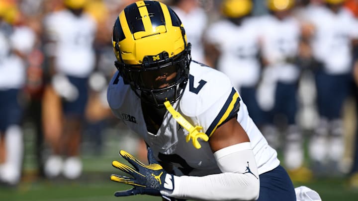 CHAMPAIGN, IL - OCTOBER 19: Michigan Wolverines Defensive Back Will Johnson (2) warms up for the college football game between the Michigan Wolverines and the Illinois Fighting Illini on October 19, 2024, at Memorial Stadium, in Champaign, Illinois.