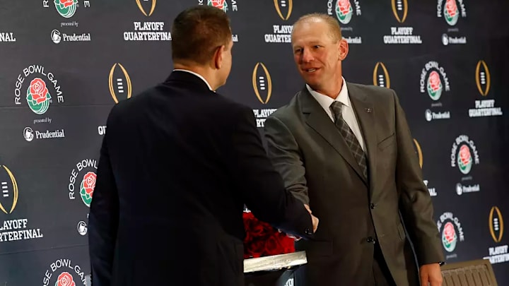 Alabama Football Head Coach Kalen DeBoer and Indiana Football Head Coach Curt Cignetti shake hands in front of the media during the Rose Bowl Press Conference in Los Angeles, CA on Wednesday, Dec 31, 2025.