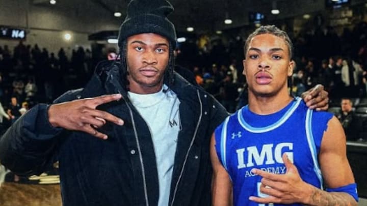During Darius Acuff Jr.'s (right) return to Detroit this week to play with his IMG Academy squad, he posed for a photo with hometown friend Bryce Underwood. Acuff is a 5-star committed to Arkansas basketball, while Underwood is a 5-star quarterback who will play at Michigan.