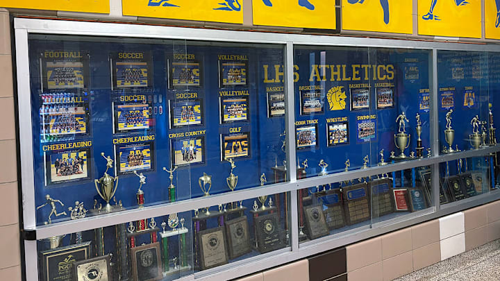 Laurel high seeks to add to the pack trophy case outside the school's gym as the Spartans seek their first boys basketball state championship since 1980.