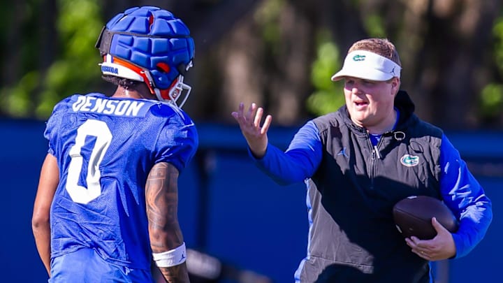 Florida Gators defensive coordinator Austin Armstrong coaches Florida Gators defensive back Sharif Denson (0) during University of Florida Gators    Spring football practice at Sanders Practice Fields in Gainesville, FL on Tuesday, March 19, 2024. [Doug Engle/Gainesville Sun]
