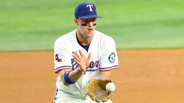 May 28, 2025; Arlington, Texas, USA; Texas Rangers third baseman Josh Jung (6) fields a ball during the fifth inning against the Toronto Blue Jays at Globe Life Field. Mandatory Credit: Kevin Jairaj-Imagn Images May 28, 2025; Arlington, Texas, USA; Texas Rangers third baseman Josh Jung (6) fields a ball during the fifth inning against the Toronto Blue Jays at Globe Life Field. Mandatory Credit: Kevin Jairaj-Imagn Images