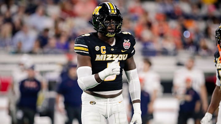 Dec 27, 2025; Jacksonville, FL, USA; Missouri Tigers defensive end Zion Young (9) looks on before a play against the Virginia Cavaliers in the first half at EverBank Stadium. Mandatory Credit: Travis Register-Imagn Images Dec 27, 2025; Jacksonville, FL, USA; Missouri Tigers defensive end Zion Young (9) looks on before a play against the Virginia Cavaliers in the first half at EverBank Stadium. Mandatory Credit: Travis Register-Imagn Images