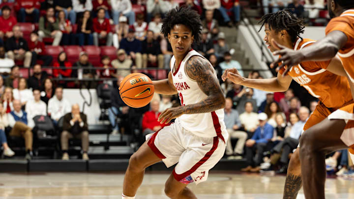 Alabama guard Aden Holloway dribbles the ball in the first half of the game against Texas on Jan. 10, 2025.
