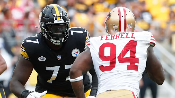 Sep 10, 2023; Pittsburgh, Pennsylvania, USA;  Pittsburgh Steelers offensive tackle Broderick Jones (77) blocks against San Francisco 49ers defensive end Clelin Ferrell (94) during the fourth quarter at Acrisure Stadium. Mandatory Credit: Charles LeClaire-Imagn Images
