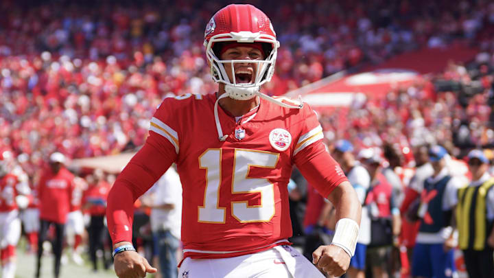 Aug 17, 2024; Kansas City, Missouri, USA; Kansas City Chiefs quarterback Patrick Mahomes (15) celebrates toward fans against the Detroit Lions prior to the game at GEHA Field at Arrowhead Stadium. Mandatory Credit: Denny Medley-Imagn Images