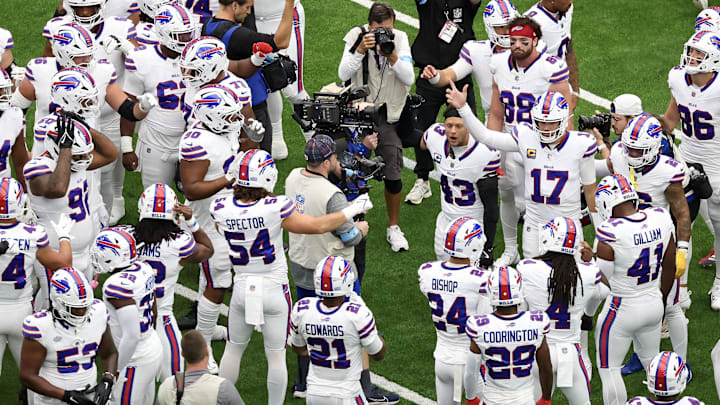 Buffalo Bills quarterback Josh Allen and teammates huddle before playing against the Houston Texans at NRG Stadium.