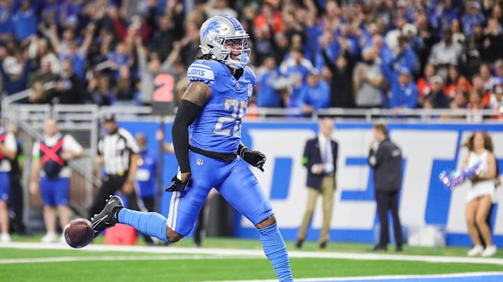 Detroit Lions running back Jahmyr Gibbs runs into the end zone for a touchdown against Denver