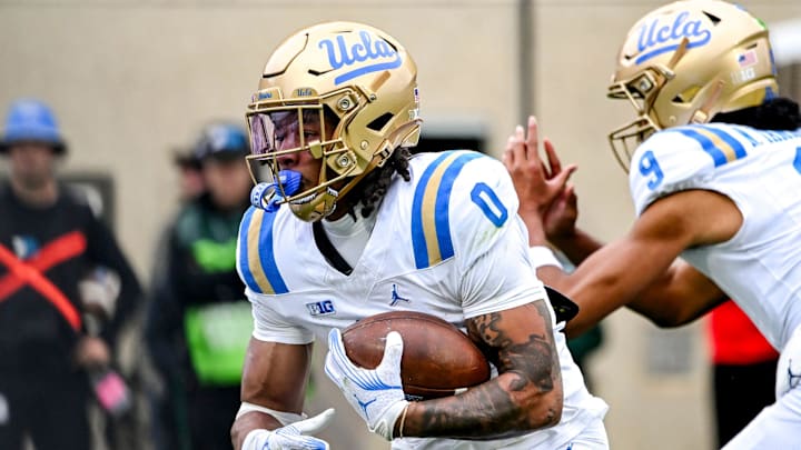 UCLA's Jalen Berger runs the ball against Michigan State during the third quarter on Saturday, Oct. 11, 2025, at Spartan Stadium in East Lansing.