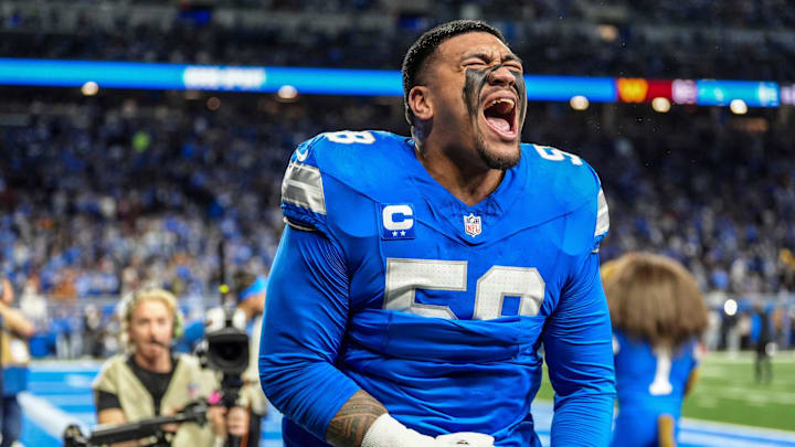 Detroit Lions offensive tackle Penei Sewell (58) yells out after warming up before the game against the Washington Commanders at Ford Field in Detroit, Saturday, Jan. 18, 2025.