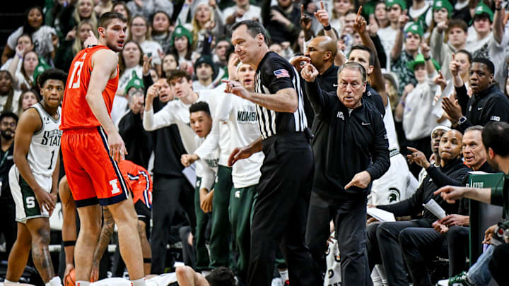 Michigan State's head coach Tom Izzo, right, signals Spartans ball after a scrum for possession during the first half in the game against Illinois on Sunday, Jan. 19, 2025, at the Breslin Center in East Lansing.