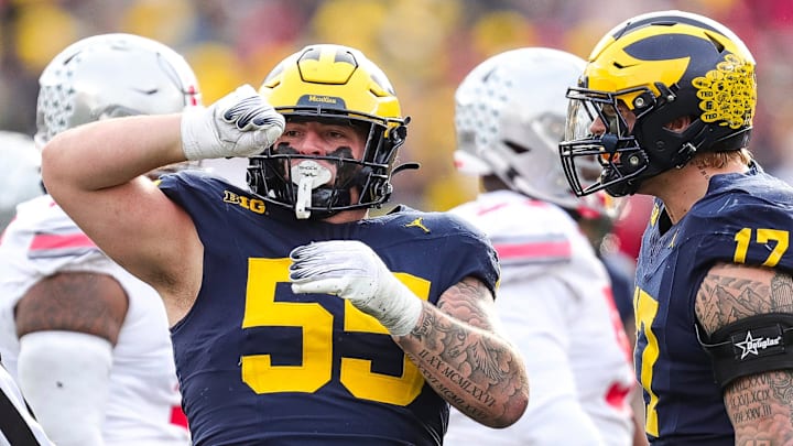 Michigan defensive lineman Mason Graham celebrates a tackle against Ohio State during the second half at Michigan Stadium in Ann Arbor on Saturday, Nov. 25, 2023.