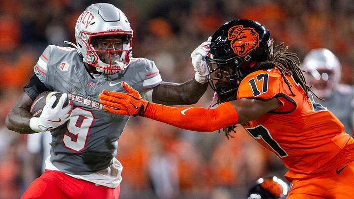 UNLV Rebels running back Jai'Den Thomas and Oregon State Beavers defensive back Skyler Thomas.