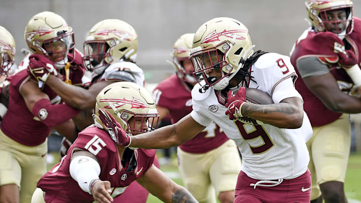 Apr 20, 2024; Tallahassee, Florida, USA; Florida State Seminoles running back Lawrance Toafili (9) runs the ball during the Spring Showcase at Doak S. Campbell Stadium. Mandatory Credit: Melina Myers-Imagn Images