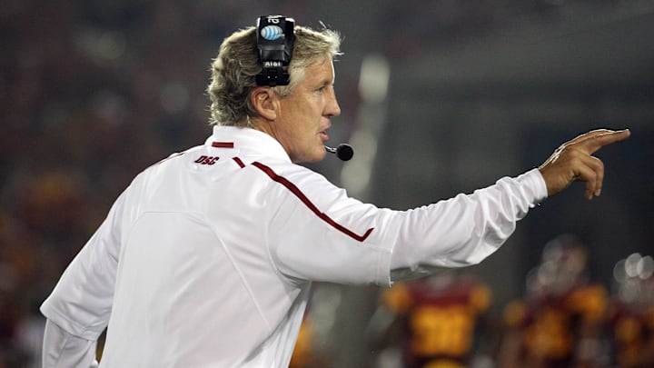 September 26, 2009; Los Angeles, CA, USA; Southern California Trojans head coach Pete Carroll signals to the team against the Washington State Cougars during the second half at the Los Angeles Memorial Coliseum. Southern California defeats Washington State 27-6. Mandatory Credit: Gary A. Vasquez-Imagn Images