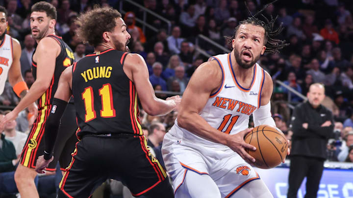 New York Knicks guard Jalen Brunson (11) looks to post up against Atlanta Hawks guard Trae Young (11) in the second quarter at Madison Square Garden. New York Knicks guard Jalen Brunson (11) looks to post up against Atlanta Hawks guard Trae Young (11) in the second quarter at Madison Square Garden.